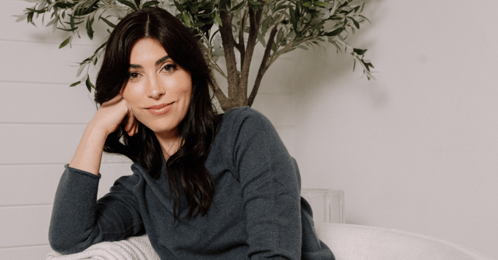 Shauna sitting on chair